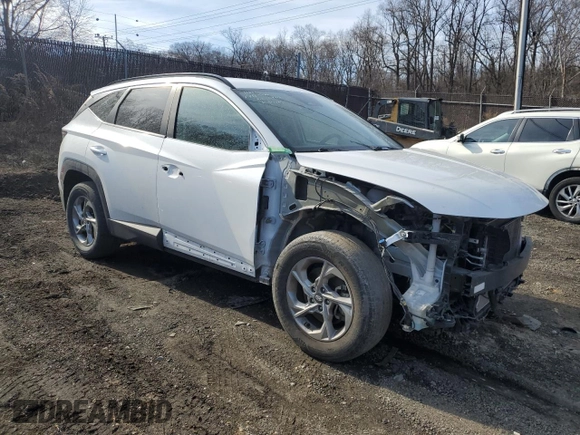 2022 Hyundai Tucson SEL with VIN 5NMJBCAE0NH027913, listed as a Copart auction lot 47072315 with 56,881 mi miles and Salvage Title. Bid and sale history available at carsss.com. Image 4.