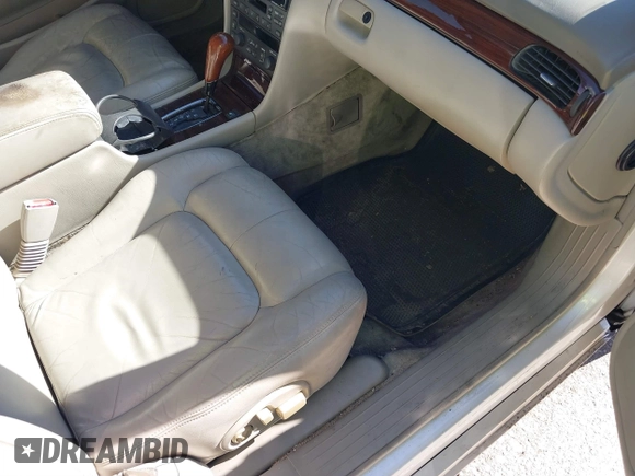 2002 Cadillac Seville Luxury SLS z VIN 1G6KS54Y52U231880, wystawiony jako IAAI lot #40911457 z przebiegiem 148 100 mil mil oraz . Historia ofert i sprzedaży dostępna na DreamBid. Obrazek 5.