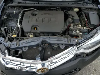 2016 Toyota Corolla L z VIN 5YFBURHE3GP567434, wystawiony jako Copart lot #58388835 z przebiegiem 130 502 mil mil oraz Szkoda całkowita • Salvage title. Historia ofert i sprzedaży dostępna na DreamBid. Obrazek 11.