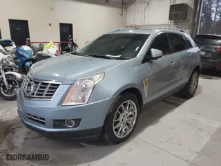 2014 Cadillac SRX Performance Collection with VIN 3GYFNCE38ES588093, listed as a IAAI auction lot 41423616 with 173,320 mi miles. Bid and sale history available at carsss.com. Image 17.