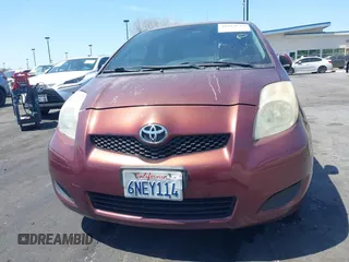2010 Toyota Yaris with VIN JTDJT4K38A5324103, listed as a IAAI auction lot 41964619 with 149,874 mi miles. Bid and sale history available at carsss.com. Image 13.