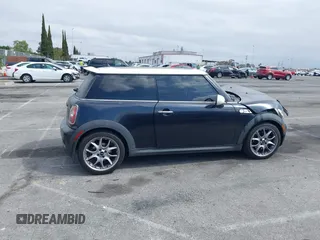 2007 MINI Hardtop S with VIN WMWMF73557TT80376, listed as a IAAI auction lot 42067228 with 174,262 mi miles and . Bid and sale history available at DreamBid. Image 13.