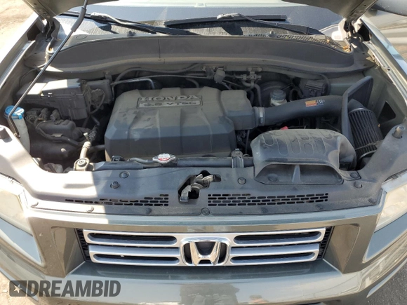 2007 Honda Ridgeline RTL w/Leather with VIN 2HJYK16587H531177, listed as a Copart auction lot 70881344 with 196,938 mi miles and Salvage Title. Bid and sale history available at carsss.com. Image 12.