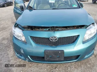 2009 Toyota Corolla with VIN JTDBL40E29J017358, listed as a IAAI auction lot 41041604 with 233,205 mi miles. Bid and sale history available at carsss.com. Image 6.