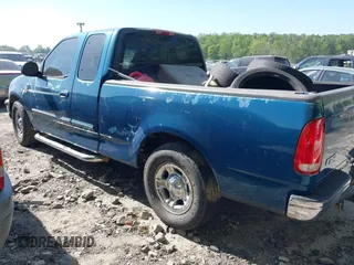 2000 Ford F-150 XL with VIN 1FTRX17L5YNC02971, listed as a IAAI auction lot 42041309 with Not provided miles and . Bid and sale history available at DreamBid. Image 3.