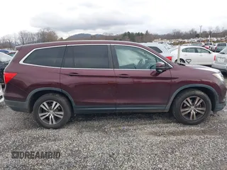 2016 Honda Pilot EX-L with VIN 5FNYF6H58GB072368, listed as a IAAI auction lot 41055222 with 130,813 mi miles. Bid and sale history available at carsss.com. Image 13.