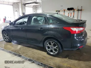 2013 Ford Focus SE with VIN 1FADP3F21DL348827, listed as a Copart auction lot 63589405 with 144,156 mi miles and Salvage title. Bid and sale history available at DreamBid. Image 2.