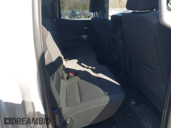 2018 Chevrolet Silverado 1500 LT with VIN 1GCVKREH4JZ323242, listed as a IAAI auction lot 41971945 with 63,915 mi miles and . Bid and sale history available at DreamBid. Image 8.