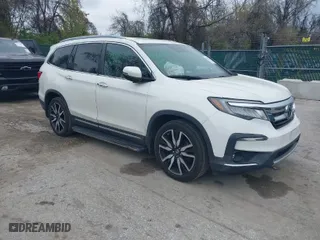 2019 Honda Pilot Touring 8-Passenger with VIN 5FNYF5H93KB001858, listed as a IAAI auction lot 42001069 with 73,092 mi miles. Bid and sale history available at carsss.com. Image 1.