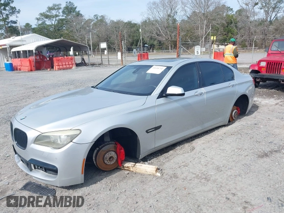 2011 BMW 7 Series 740i with VIN WBAKA4C59BC392365, listed as a IAAI auction lot 41618732 with 142,270 mi miles. Bid and sale history available at carsss.com. Image 2.