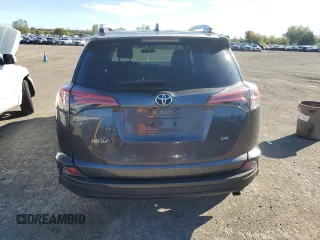 2016 Toyota RAV4 LE with VIN 2T3ZFREV3GW269727, listed as a Copart auction lot 74796814 with 235,242 mi miles and Salvage Title. Bid and sale history available at DreamBid. Image 6.