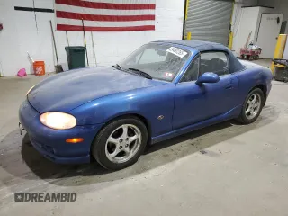 1999 Mazda MX-5 Miata with VIN JM1NB3532X0136645, listed as a Copart auction lot 59480265 with 160,936 mi miles and Clean title. Bid and sale history available at DreamBid. Image 1.