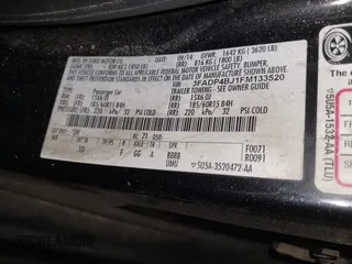 2015 Ford Fiesta SE with VIN 3FADP4BJ1FM133520, listed as a IAAI auction lot 42229311 with 174,734 mi miles and . Bid and sale history available at DreamBid. Image 9.