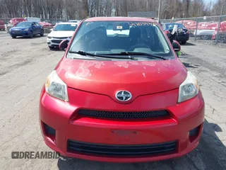 2008 Scion xD with VIN JTKKU104X8J027713, listed as a IAAI auction lot 42039328 with 217,720 mi miles. Bid and sale history available at carsss.com. Image 6.