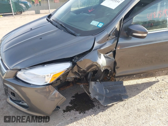2015 Ford Escape Titanium with VIN 1FMCU9J90FUB58306, listed as a IAAI auction lot 41815151 with 136,835 mi miles. Bid and sale history available at carsss.com. Image 6.
