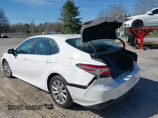 2020 Toyota Camry LE with VIN 4T1C11AK9LU315906, listed as a IAAI auction lot 41809360 with 97,401 mi miles. Bid and sale history available at carsss.com. Image 6.