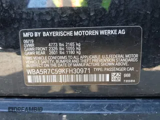 2019 BMW 3 Series 330i xDrive with VIN WBA5R7C59KFH30971, listed as a IAAI auction lot 42005244 with 59,514 mi miles and . Bid and sale history available at DreamBid. Image 9.