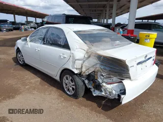 2004 Toyota Camry LE with VIN 4T1BF30K54U071960, listed as a IAAI auction lot 41513417 with 165,738 mi miles. Bid and sale history available at carsss.com. Image 3.