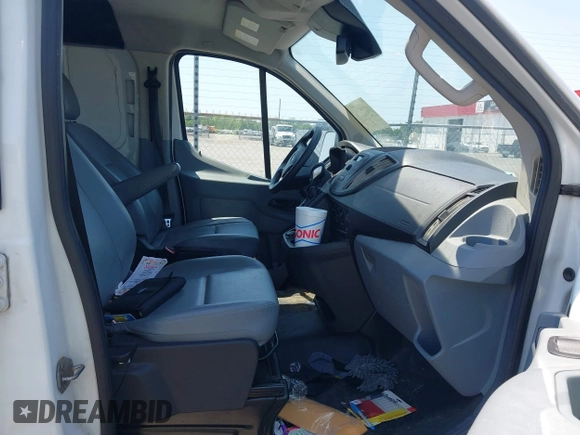 2018 Ford Transit with VIN 1FTYE1ZM3JKA22788, listed as a IAAI auction lot 42298271 with 325,277 mi miles and . Bid and sale history available at DreamBid. Image 5.
