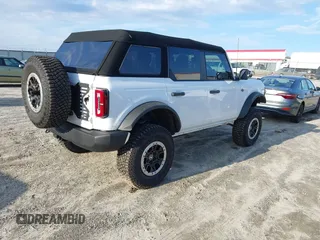 2022 Ford Bronco with VIN 1FMEE5DP7NLB41371, listed as a IAAI auction lot 41575668 with 5,168 mi miles. Bid and sale history available at carsss.com. Image 4.