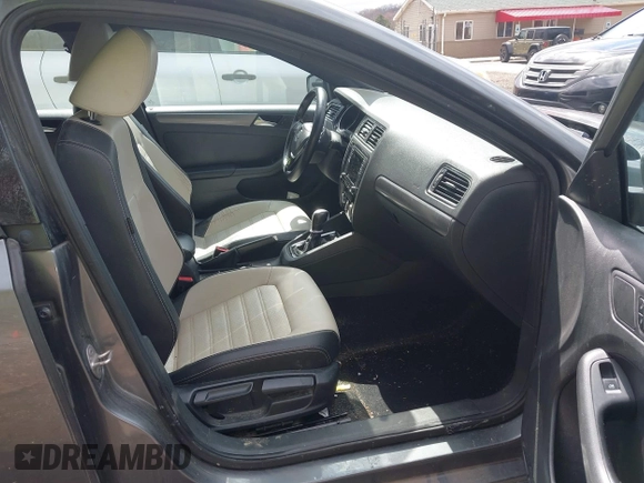 2016 Volkswagen Jetta Sport z VIN 3VWD17AJ7GM225289, wystawiony jako IAAI lot #41978267 z przebiegiem 142 556 mil mil oraz . Historia ofert i sprzedaży dostępna na DreamBid. Obrazek 5.