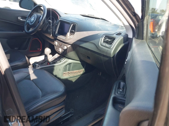 2018 Jeep Compass Trailhawk with VIN 3C4NJDDB3JT231923, listed as a IAAI auction lot 41929198 with 129,001 mi miles and . Bid and sale history available at carsss.com. Image 5.