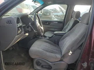 2004 GMC Envoy SLE with VIN 1GKDT13S342304711, listed as a Copart auction lot 44695385 with 129,804 mi miles and Salvage Title. Bid and sale history available at carsss.com. Image 7.