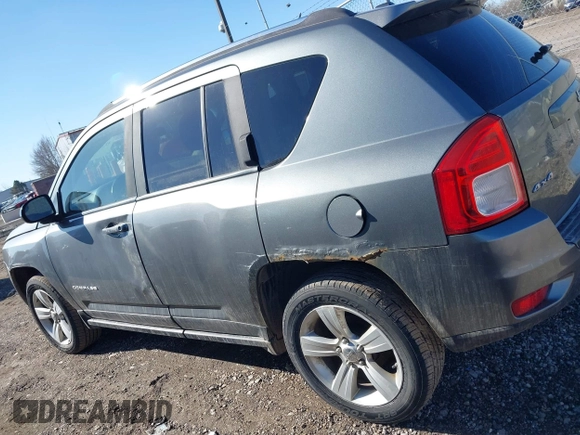 2012 Jeep Compass Latitude with VIN 1C4NJDEBXCD563543, listed as a IAAI auction lot 41711187 with 149,100 mi miles. Bid and sale history available at carsss.com. Image 14.