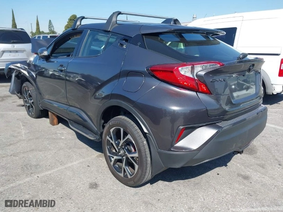 2019 Toyota C-HR XLE with VIN JTNKHMBX4K1026497, listed as a IAAI auction lot 41848644 with 53,211 mi miles. Bid and sale history available at carsss.com. Image 3.