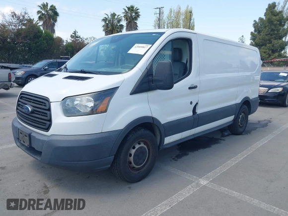2016 Ford Transit Cargo with VIN 1FTYE1YM6GKB51876, listed as a IAAI auction lot 42009817 with 139,446 mi miles. Bid and sale history available at carsss.com. Image 2.