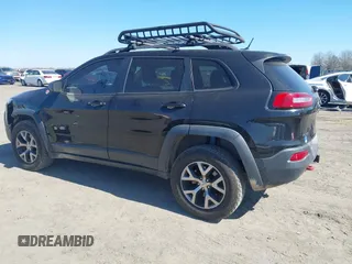 2015 Jeep Cherokee Trailhawk with VIN 1C4PJMBS5FW577470, listed as a IAAI auction lot 41565837 with 191,105 mi miles. Bid and sale history available at carsss.com. Image 14.
