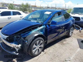 2024 Tesla Model Y Long Range with VIN 7SAYGDEE6RA242980, listed as a IAAI auction lot 40121685 with 9,126 mi miles and . Bid and sale history available at DreamBid. Image 2.
