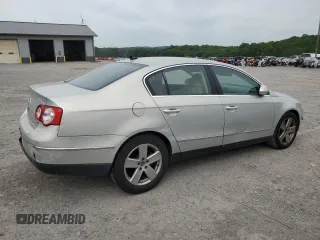 2009 Volkswagen Passat z VIN WVWJK93C49P054575, wystawiony jako Copart lot #57880855 z przebiegiem 148 327 mil mil oraz Szkody całkowita. Historia ofert i sprzedaży dostępna na DreamBid. Obrazek 3.