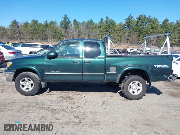 2000 Toyota Tundra Limited with VIN 5TBBT4815YS065867, listed as a IAAI auction lot 41995501 with 208,889 mi miles. Bid and sale history available at carsss.com. Image 14.