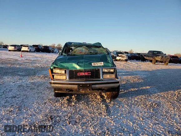 1993 GMC Sierra 1500 z VIN 2GTEK19K8P1562964, wystawiony jako Copart lot #86767744 z przebiegiem 237 615 mil mil oraz Czysty tytuł • Clean title. Historia ofert i sprzedaży dostępna na DreamBid. Obrazek 11.