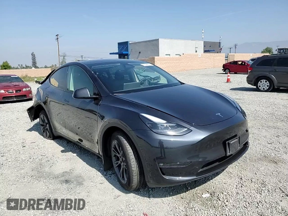 2024 Tesla Model Y Long Range z VIN 7SAYGDEE3RF121102, wystawiony jako Copart lot #60548895 z przebiegiem 13 336 mil mil oraz Szkoda całkowita • Salvage title. Historia ofert i sprzedaży dostępna na DreamBid. Obrazek 14.