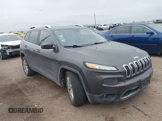 2014 Jeep Cherokee Limited with VIN 1C4PJLDS9EW301718, listed as a IAAI auction lot 41615778 with 114,022 mi miles and . Bid and sale history available at DreamBid. Image 1.