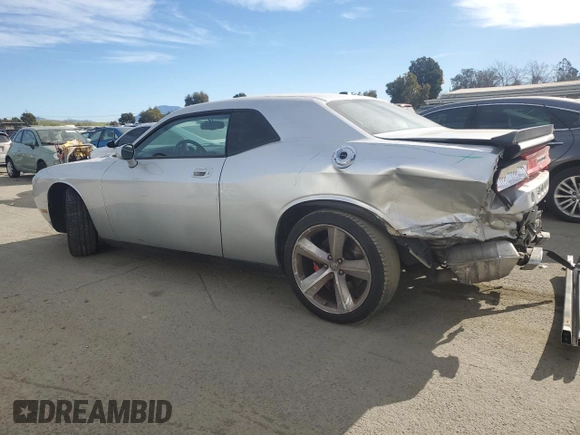 2010 Dodge Challenger SRT-8 with VIN 2B3CJ7DW4AH318204, listed as a Copart auction lot 86770904 with 91,830 mi miles and Salvage title. Bid and sale history available at DreamBid. Image 2.