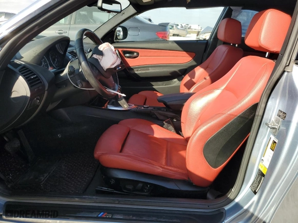 2011 BMW 1 Series 135i with VIN WBAUC9C59BVM11260, listed as a Copart auction lot 86721684 with 56,914 mi miles and Salvage Title. Bid and sale history available at carsss.com. Image 7.