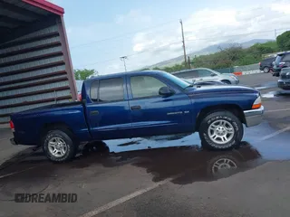 2001 Dodge Dakota Sport with VIN 1B7GL2AX01S133957, listed as a IAAI auction lot 41644558 with 156,008 mi miles. Bid and sale history available at carsss.com. Image 12.