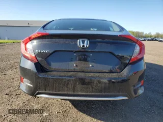 2019 Honda Civic LX with VIN 19XFC2F60KE025306, listed as a Copart auction lot 53949305 with 50,671 mi miles and Salvage Title. Bid and sale history available at DreamBid. Image 6.