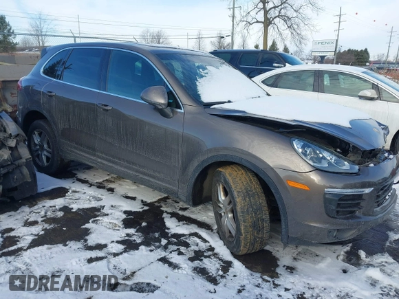 2016 Porsche Cayenne z VIN WP1AA2A21GLA05440, wystawiony jako IAAI lot #41358574 z przebiegiem 96 167 mil mil oraz . Historia ofert i sprzedaży dostępna na DreamBid. Obrazek 1.