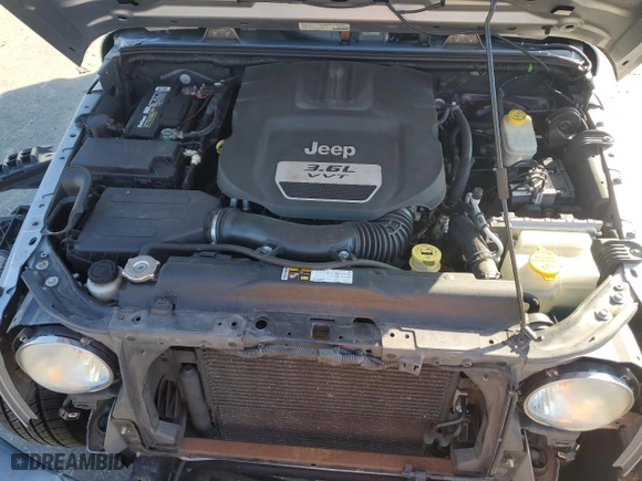 2014 Jeep Wrangler Unlimited Sport with VIN 1C4BJWDG8EL134356, listed as a Copart auction lot 74378874 with 103,318 mi miles and Salvage Title. Bid and sale history available at carsss.com. Image 11.