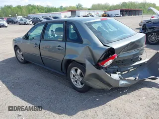 2005 Chevrolet Malibu Maxx LS z VIN 1G1ZT64815F161181, wystawiony jako IAAI lot #42178136 z przebiegiem 123 598 mil mil oraz . Historia ofert i sprzedaży dostępna na DreamBid. Obrazek 3.