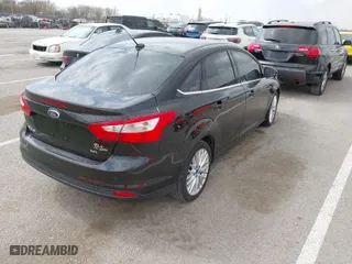 2012 Ford Focus SEL with VIN 1FAHP3H22CL284763, listed as a IAAI auction lot 41824652 with 178,451 mi miles. Bid and sale history available at carsss.com. Image 4.