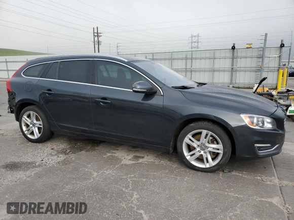2015 Volvo V60 with VIN YV1612SB5F1186312, listed as a Copart auction lot 58552405 with 77,610 mi miles and Salvage title. Bid and sale history available at DreamBid. Image 4.