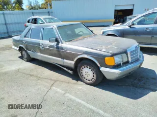 1986 Mercedes-Benz 420 with VIN WDBCA35DXGA210633, listed as a Copart auction lot 69728644 with 177,870 mi miles and Salvage Title. Bid and sale history available at carsss.com. Image 4.