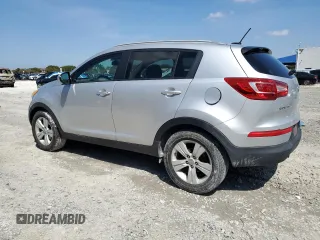 2013 Kia Sportage LX with VIN KNDPB3A26D7429389, listed as a Copart auction lot 50597295 with 217,197 mi miles and Salvage Title. Bid and sale history available at carsss.com. Image 2.