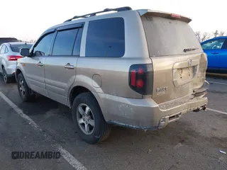 2007 Honda Pilot EX-L with VIN 2HKYF18667H509331, listed as a IAAI auction lot 41453510 with 228,746 mi miles and . Bid and sale history available at DreamBid. Image 3.