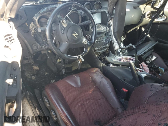 2010 Nissan 370Z Touring с VIN JN1AZ4FH2AM302515, выставлен на аукционе Copart как лот 73021334 с пробегом Не указан миль и Списание • Salvage title. История ставок и продаж доступна на DreamBid. Изображение 8.